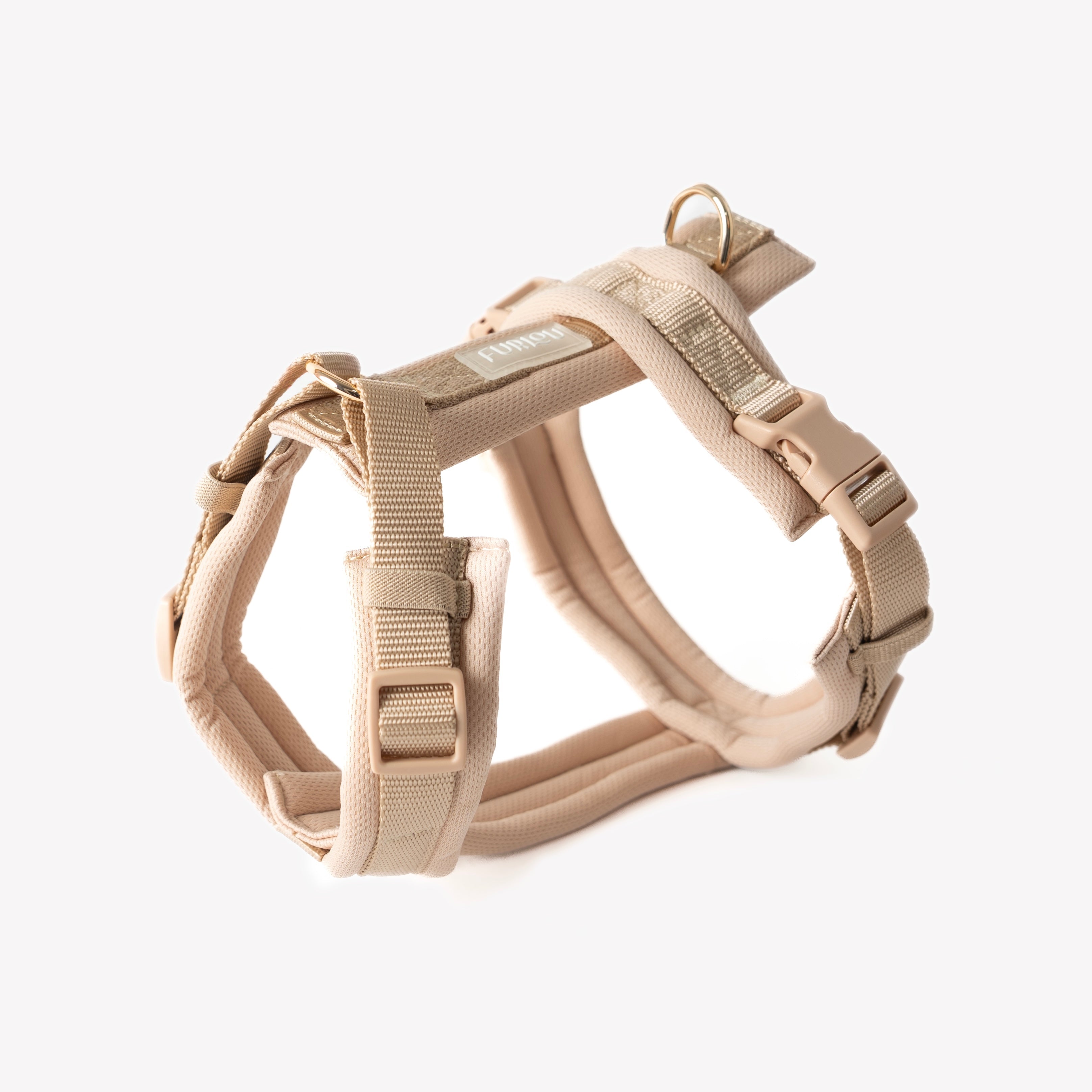 Beige dog harness on a white background