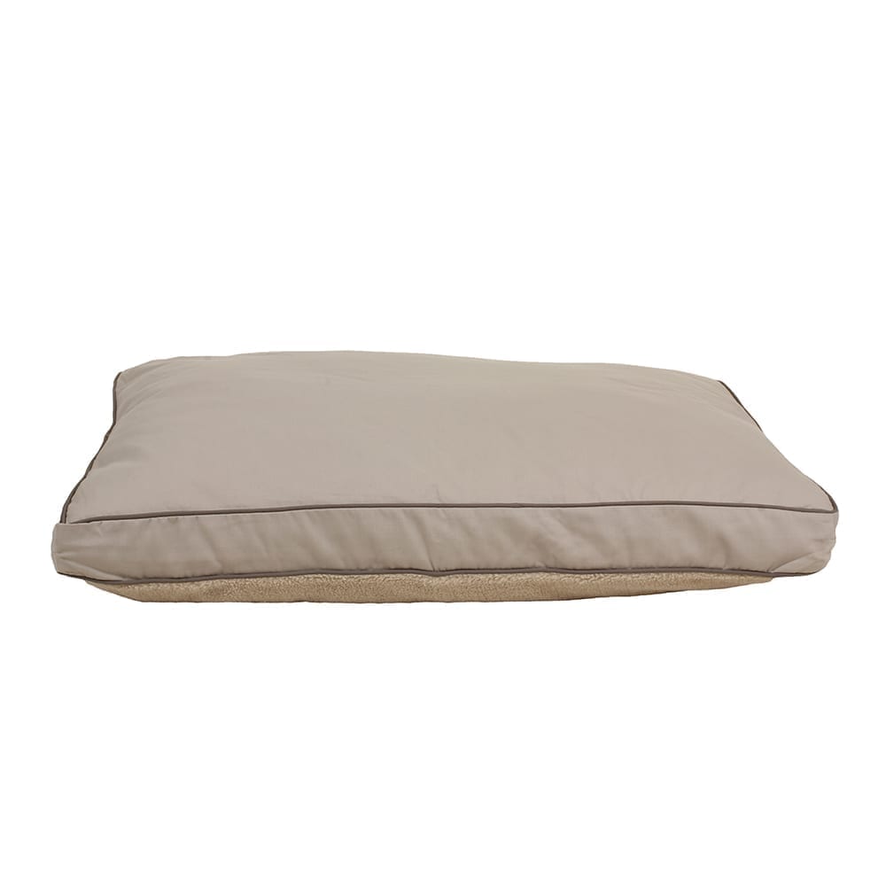 Beigedog bed on a white background